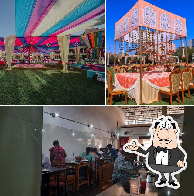 Take a seat at one of the tables at Hotel Prabhat