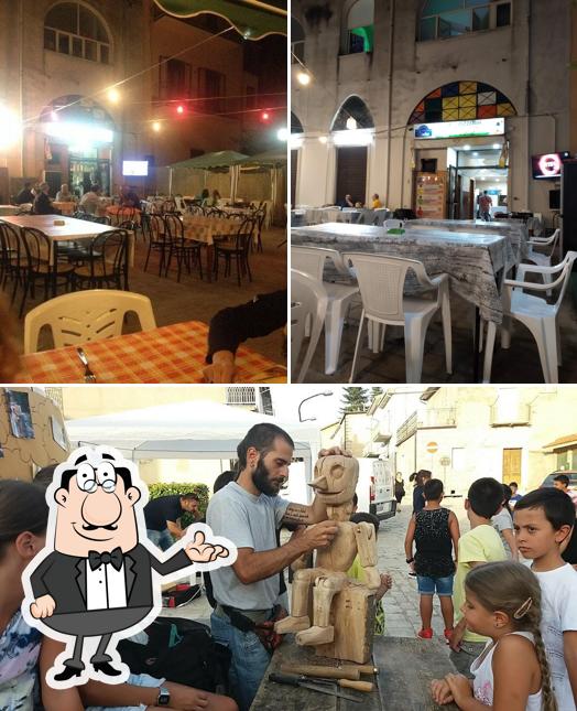Pizzeria Caffè Giardino si caratterizza per la interni e esterno
