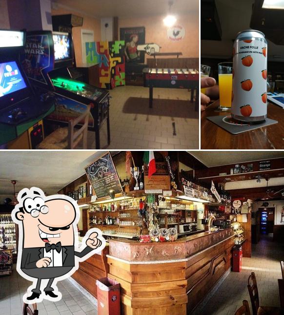Dai un’occhiata alla immagine che mostra la interni e bevanda di Osteria da Tocchetto