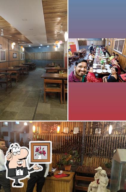 The interior of Hotel Madhura- Pure Veg Family Restaurant