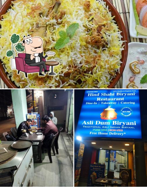 Check out the image showing interior and food at Hind Shahi Biryani