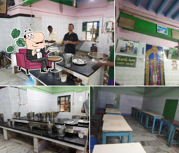 Take a seat at one of the tables at New Maduraa Hotel