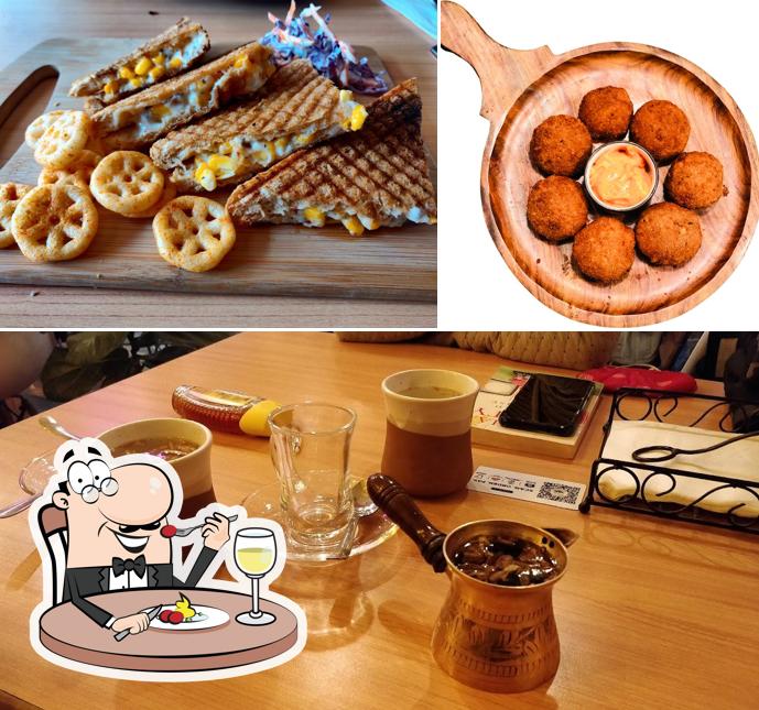 Check out the photo displaying food and interior at Alag Aasmaan-The Travel Cafe