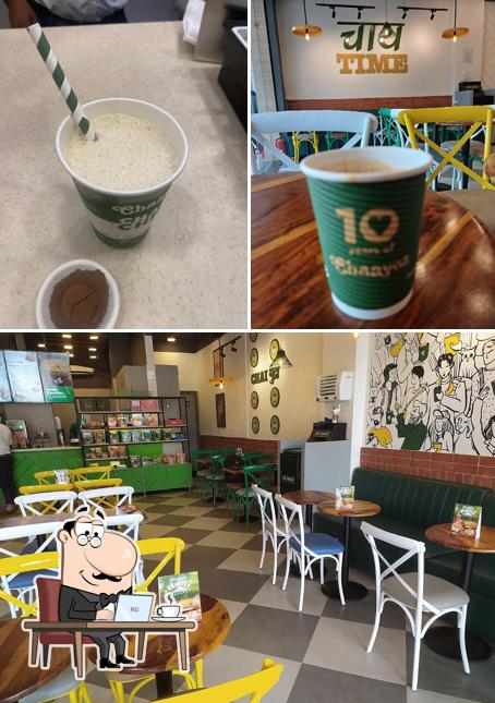 Take a seat at one of the tables at Chaayos Cafe Omaxe Faridabad