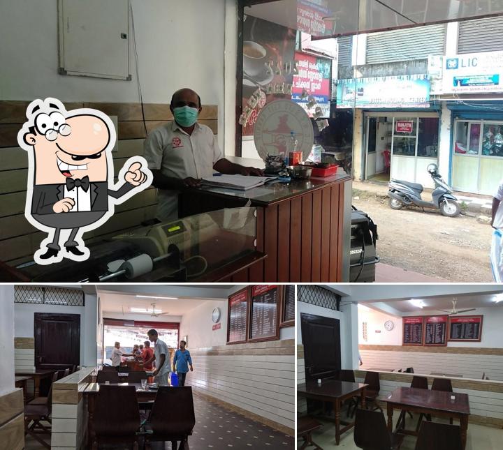 Take a seat at one of the tables at Indian Coffee house iritty, ICWCS LTD 4317-KANNUR