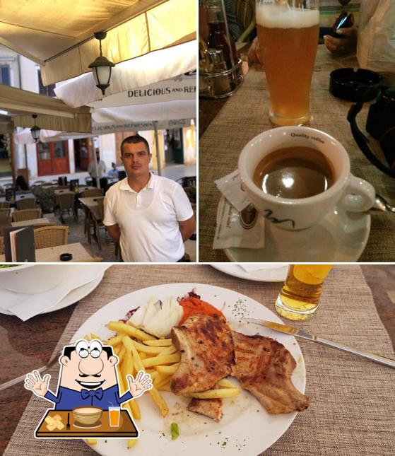 Dai un’occhiata alla foto che mostra la cibo e interni di Cafè Bar Jimmy