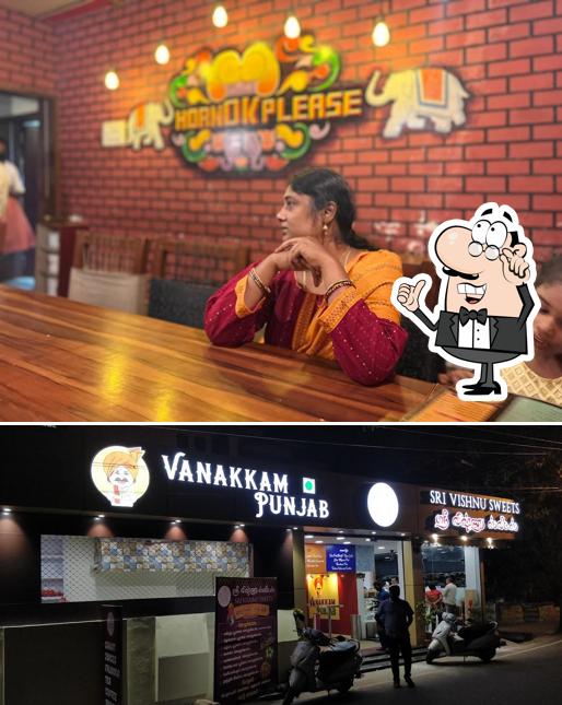 Take a seat at one of the tables at Vanakkam Punjab