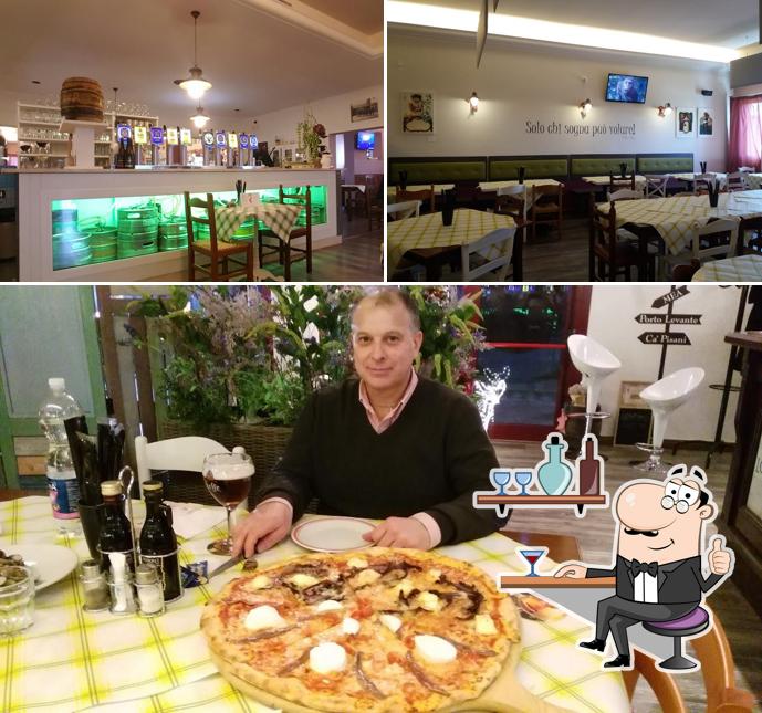 Siediti a un tavolo di Lostaria Pizza Cibo e Birra