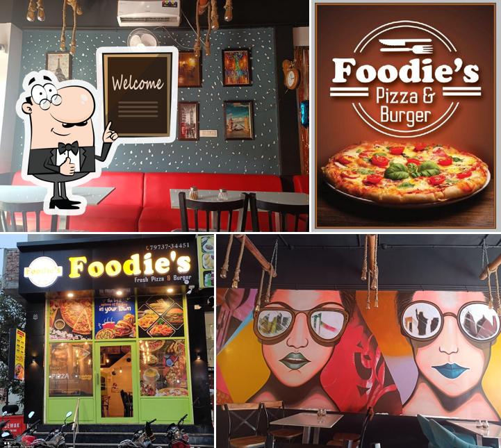 Here's a photo of Foodies cafe pizza & burger