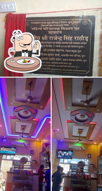 Among different things one can find food and blackboard at Sangam Bar & Restaurant