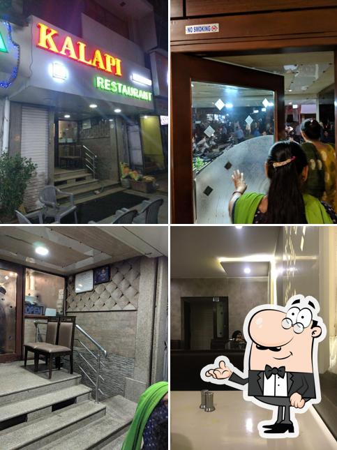 Take a seat at one of the tables at Kalapi Restaurant