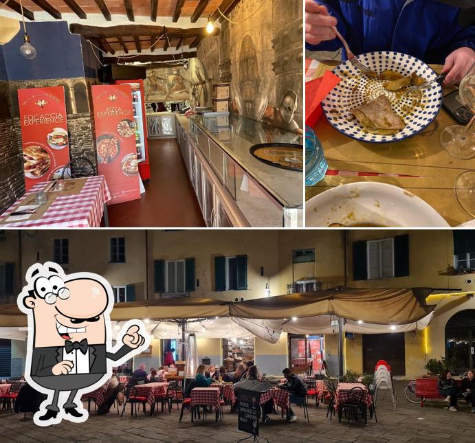 Siediti a un tavolo di OSTERIA DEL PODERE