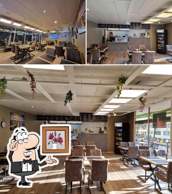 Siediti a un tavolo di Sofra Cham Pizza & Kebab Kurier
