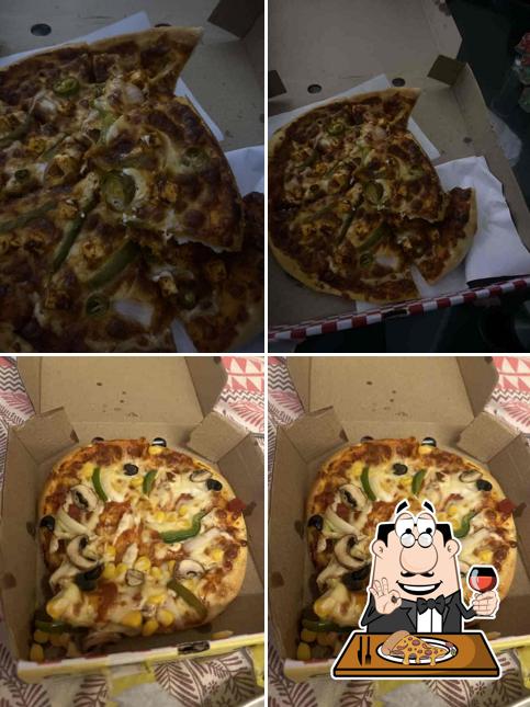 Try out pizza at Starboy Pizza & Shakes