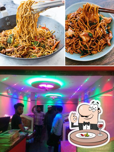 Take a look at the photo displaying food and interior at Adil Hotel
