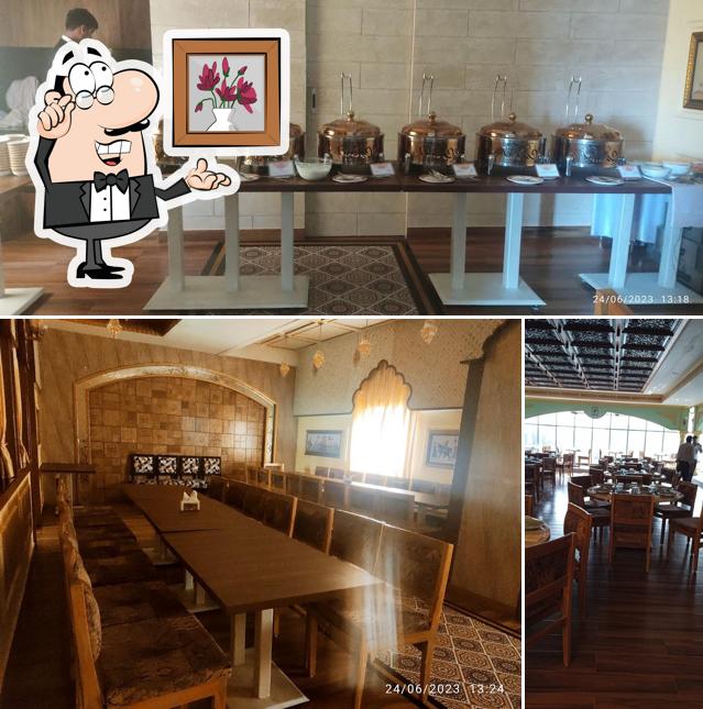 Take a seat at one of the tables at Parampara - Flavours Of India (Abids)