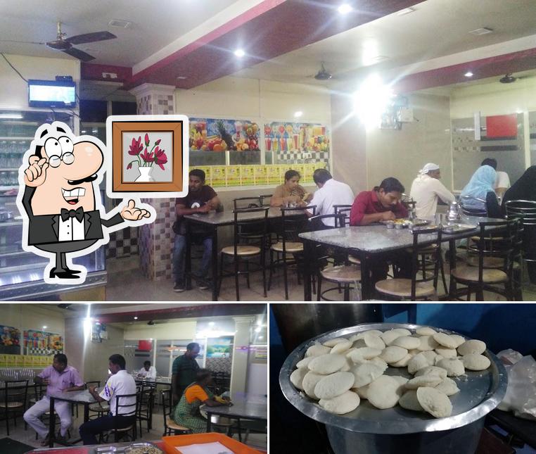 This is the image depicting interior and food at Gulan Thattukada