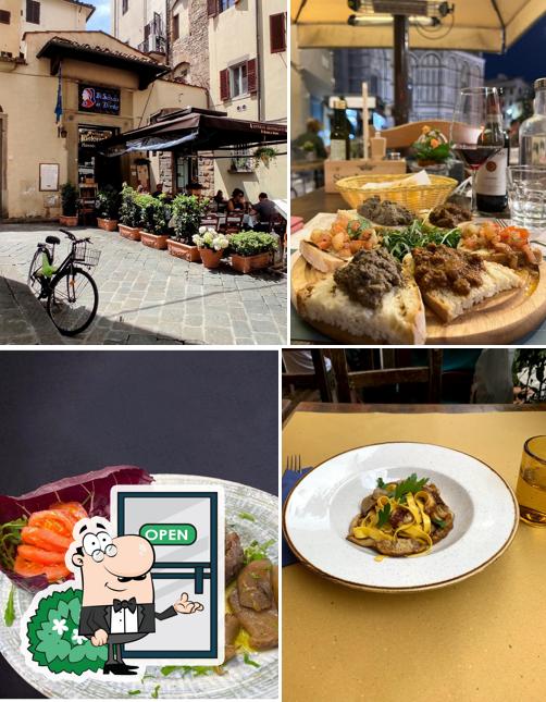Curiosa tra la parte esterna di Antico Ristorante Il Sasso di Dante - Firenze