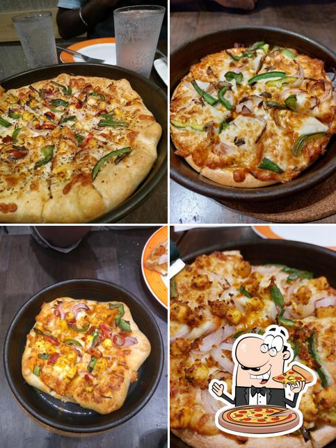 Pick pizza at Pizza Hut Shivanand Nagar, Dharwad
