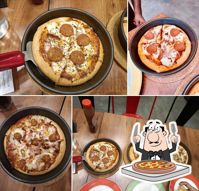 At Pizza Hut Chinakada, Kollam, you can try pizza
