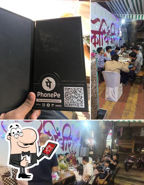 Look at the picture of Kothimbir pure veg restaurant