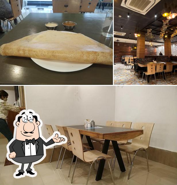 Take a seat at one of the tables at Hub Grub Restaurant