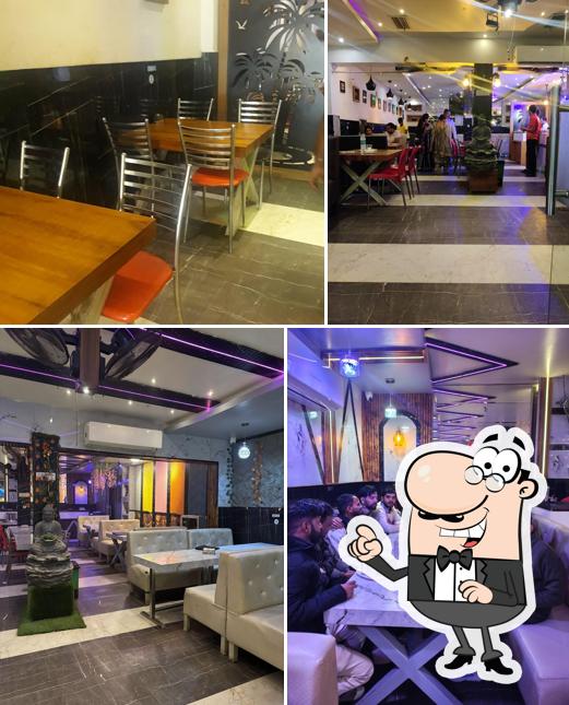 Take a seat at one of the tables at Panj Tara Dhaba