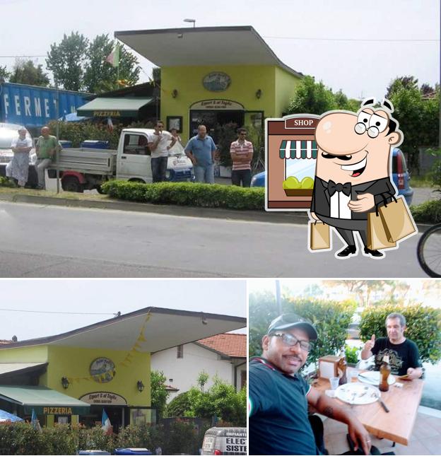 Questa è la immagine che raffigura la esterno e tavolo da pranzo di Pizzeria Peter Pan