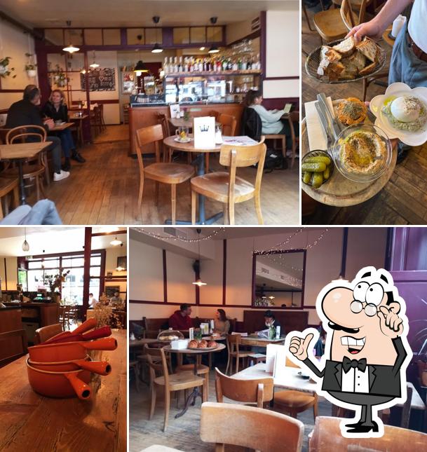 Dai un'occhiata agli interni di Café La Couronne d'Or