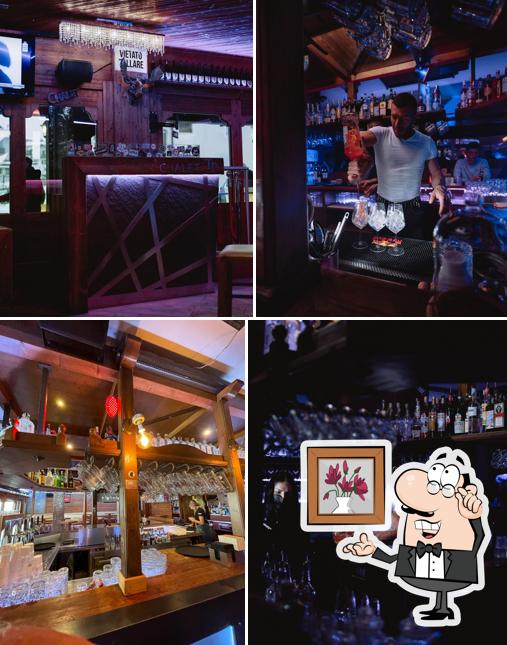 Siediti a un tavolo di Chalet Tower Pub - Club, Ristorante & Pizzeria