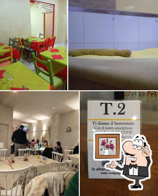 Siediti a un tavolo di Rosty pizza 2