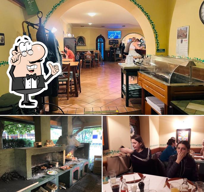 Siediti a un tavolo di Gostilna Union Bled