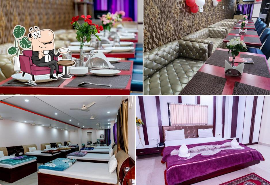 Take a seat at one of the tables at Hotel Raj & Restaurant