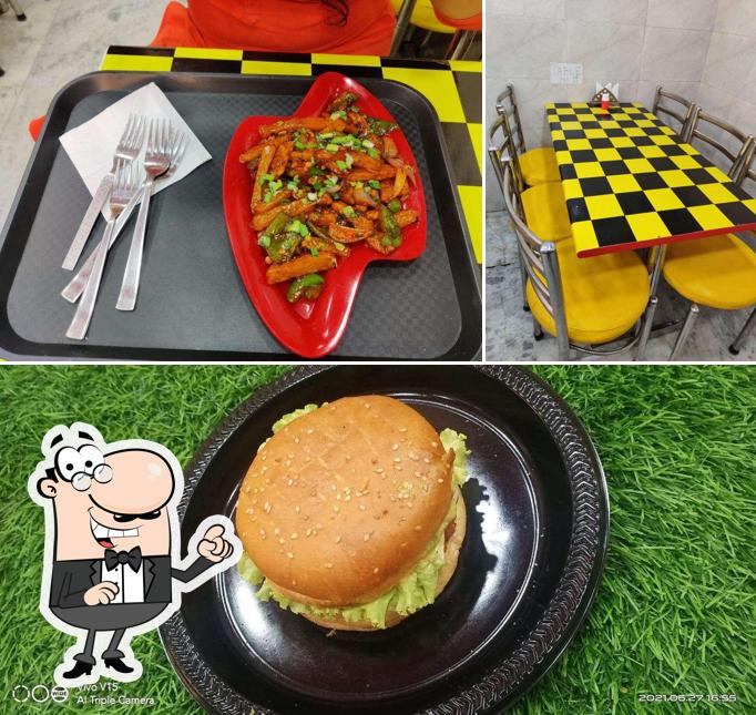 Among different things one can find interior and food at Pure Pahadi Restaurant