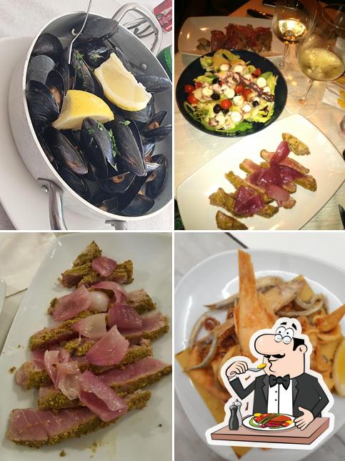 Cibo al Faro Blu - Ristorante di Pesce - Cocktail Bar- Pizzeria napoletana-Stabilimento balneare