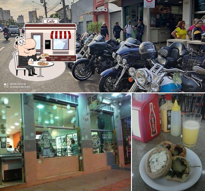 Dê uma olhada a foto ilustrando exterior e bebida no Thomaz Lanches