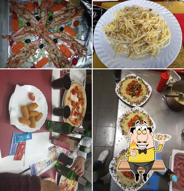 Prenditi tra i molti pasti di mare offerti a Champion Pizza