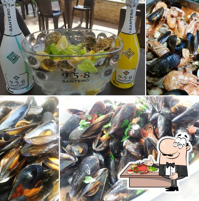 Prenditi la cucina di mare a Garden Cafè