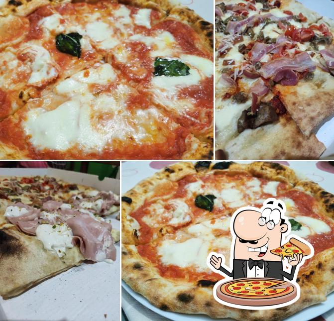 A Figli del Vesuvio Pizzeria Trattoria Rosticceria, puoi ordinare una bella pizza