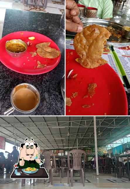 The photo of Hotel Kanhaiya Pure Veg Restaurant’s food and interior