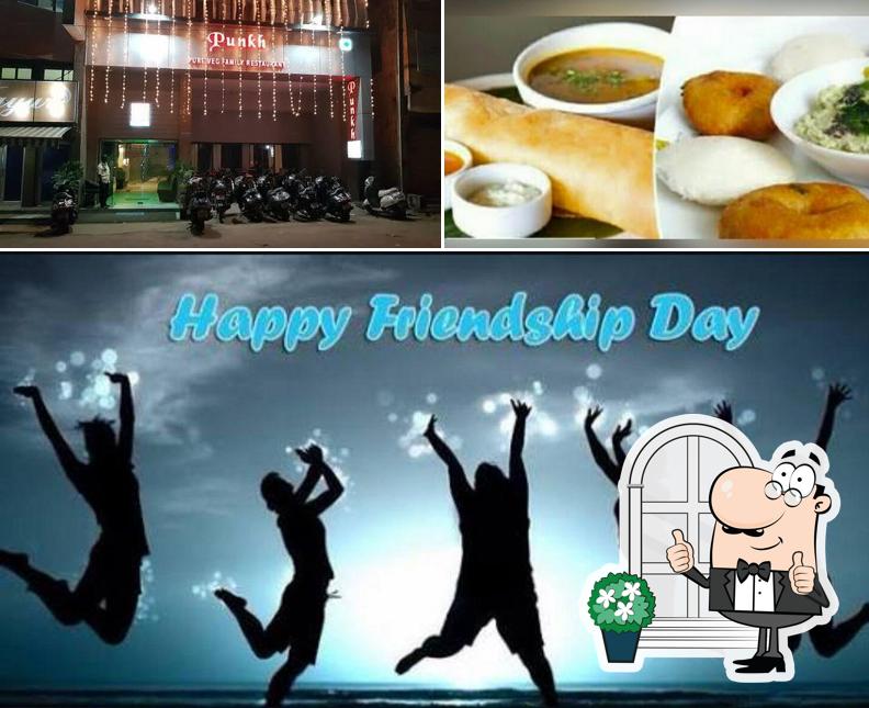 The picture of exterior and food at Punkh Restaurant (Pure Veg)