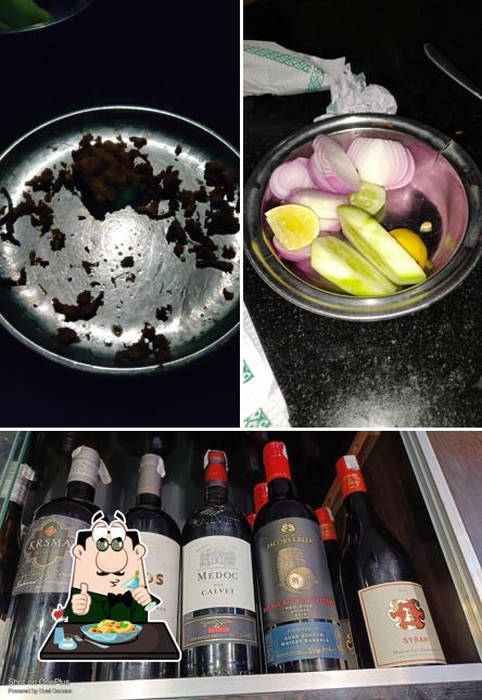 Among various things one can find food and wine at Aishwarya Hotel
