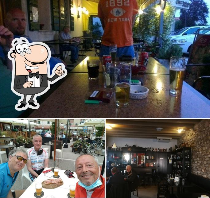 Dai un'occhiata agli interni di Antica Osteria Vittoria