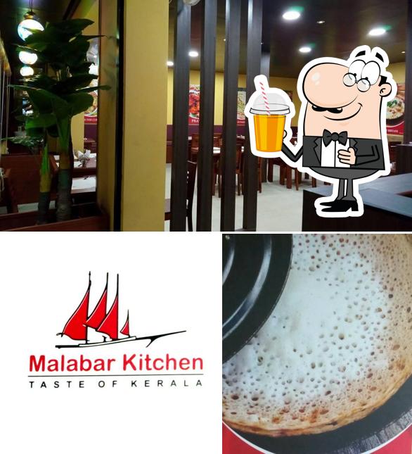 Enjoy a beverage at Malabar Kitchen