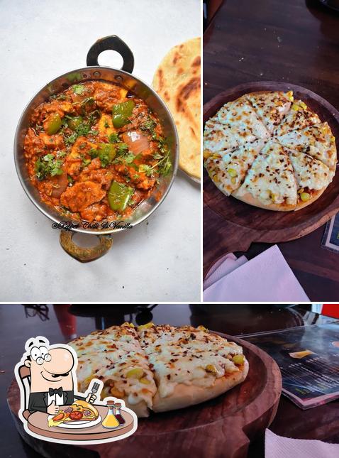 Try out pizza at Cravings Cafe And Restaurant