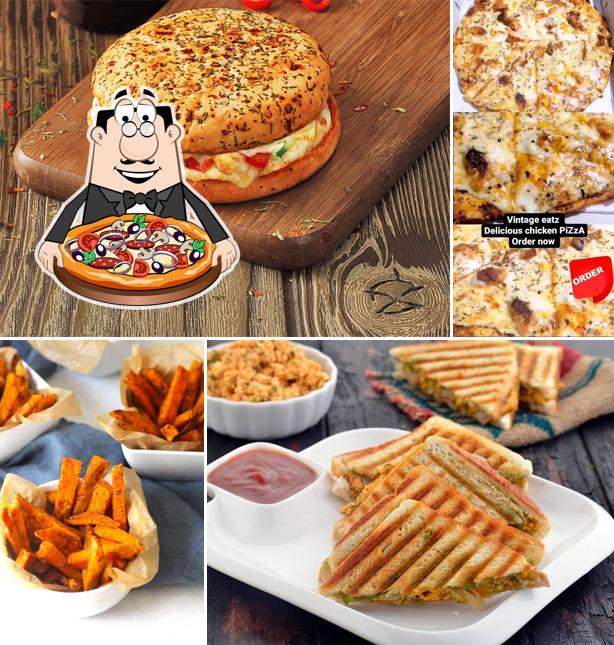 Get pizza at Vintàge cafèteriā