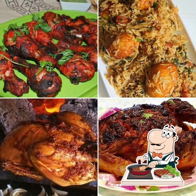 Order meat meals at The Aroma Hotel & Family Restaurant