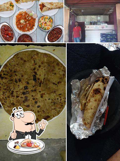 Try out pizza at Kabab E Roll