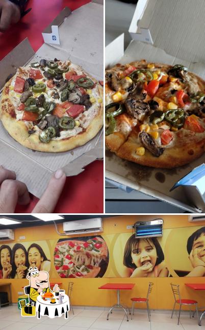 The image of food and interior at Domino's Pizza Gidc, Vapi
