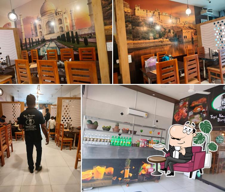 Check out how TOPI VAPPA BIRIYANI KUMBAKONAM BRANCH looks inside